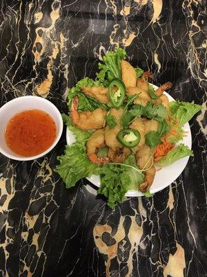 Shrimp tempura, fish filet and calamari.