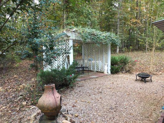 Arbor behind carriage house