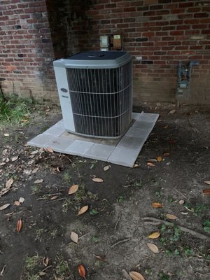 Pavers around our serviced air conditioner, to assist with mud splashes