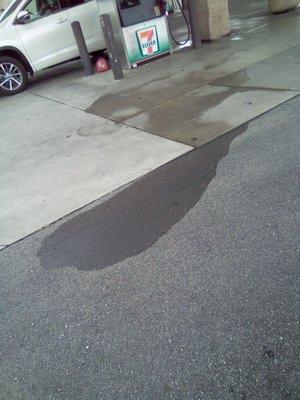 Gasoline spill left unattended by store employees.