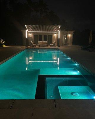 Finished pool with pool cover and Jandy Nicheless lights.