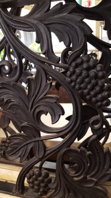 Wrought-iron in what I'm told is original from 124 years ago when the place opened.