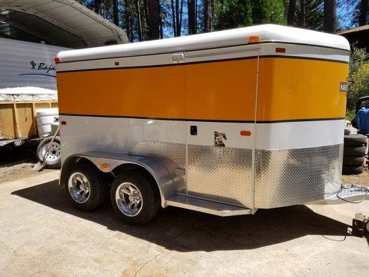 Removed and replaced axles in a custom motorcycle trailer