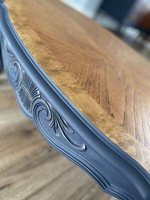 Custom refinished table with painted trim. We can customize any furniture to match your decor