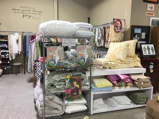 Sheets, comforter sets and other linens are for sale at God's Goods Thrift Store.