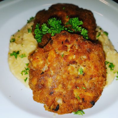 Salmon Croquettes over Cheese Grits