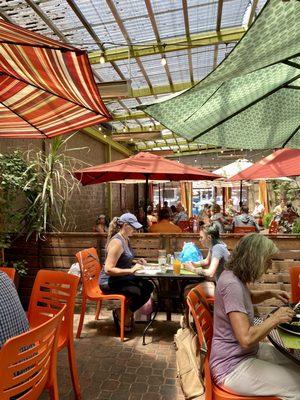 Gorgeous inviting patio area. There's a ghost there, too.