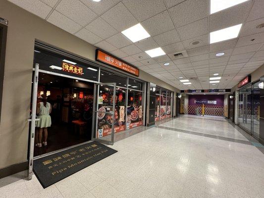 The store front in the Pacific Rim building.  There is 2 hour free parking in garage above.