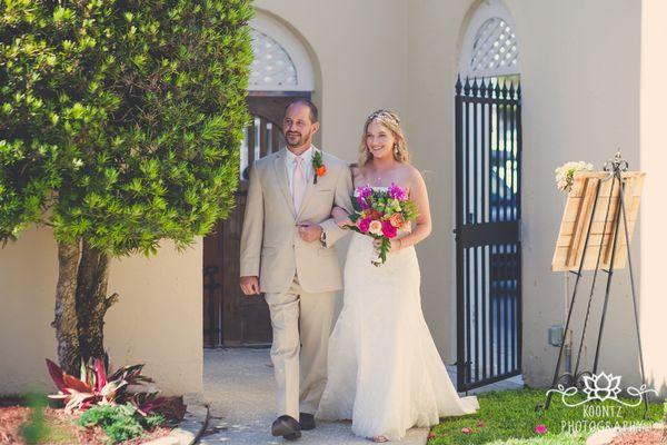 Where the processional enters the rose garden for the ceremony