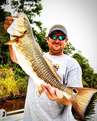 Capt Marcus with a nice back bay Redfish