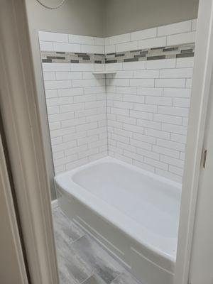 New bath. Mosiac accent and subway tile.