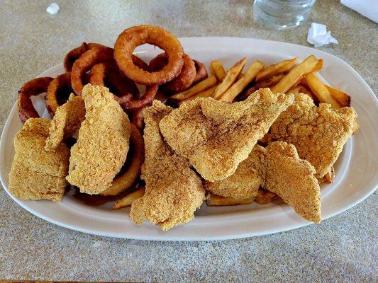 Catfish platter with fries and onion rings.