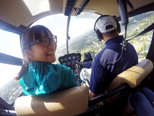 International student from China enjoying her helicopter tour as part of our Summer Fun and English program