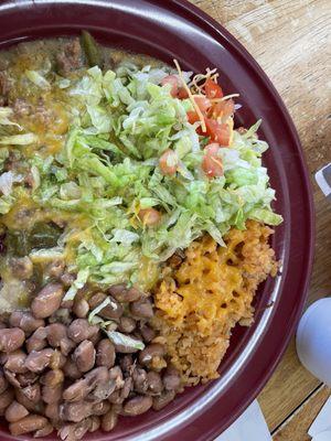 Stacked enchiladas w green chilies, beans and rice.  Yummy!!