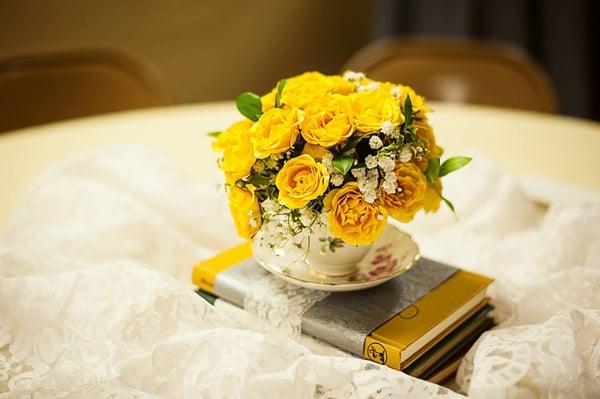 Tea cup floral arrangement for Tea time theme wedding