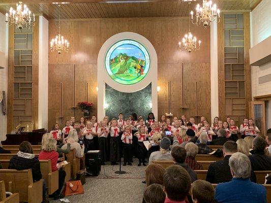 The Cottonwood Elementary School choir performs at the 2019 holiday service.