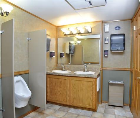 Fully equipped with all the amenities you'd find in an indoor upscale restroom